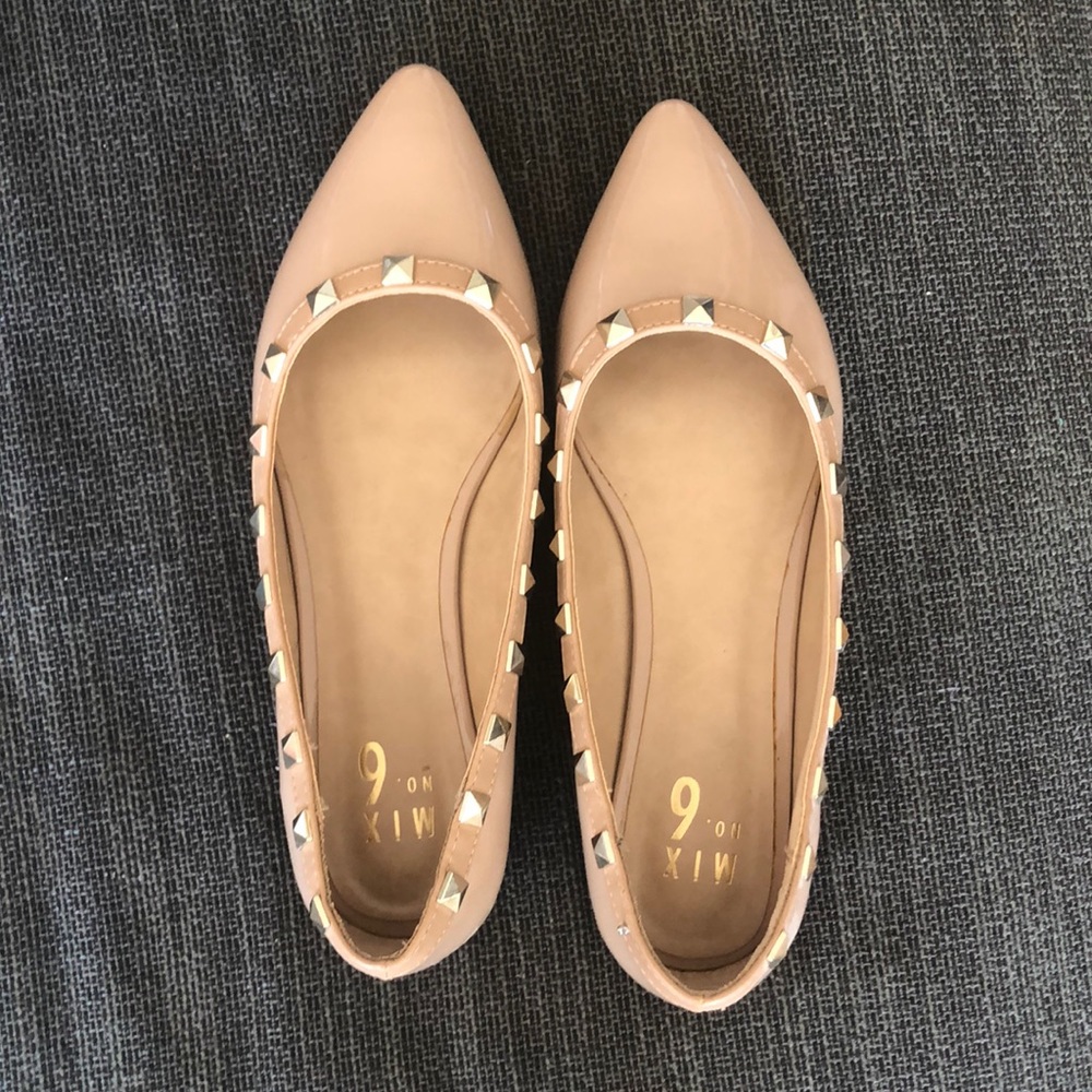 Beige flats with stud feature, never worn
